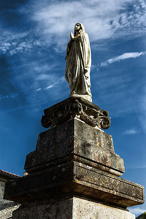Statue at the Church - Villebois-Lavalette, France
